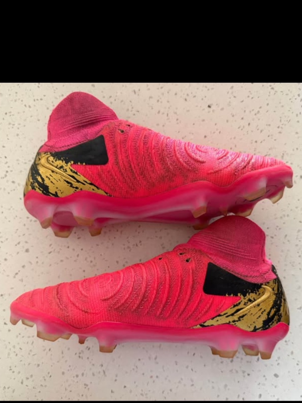 Nike Kids Soccer Cleats in Bright Pink with Gold Accent